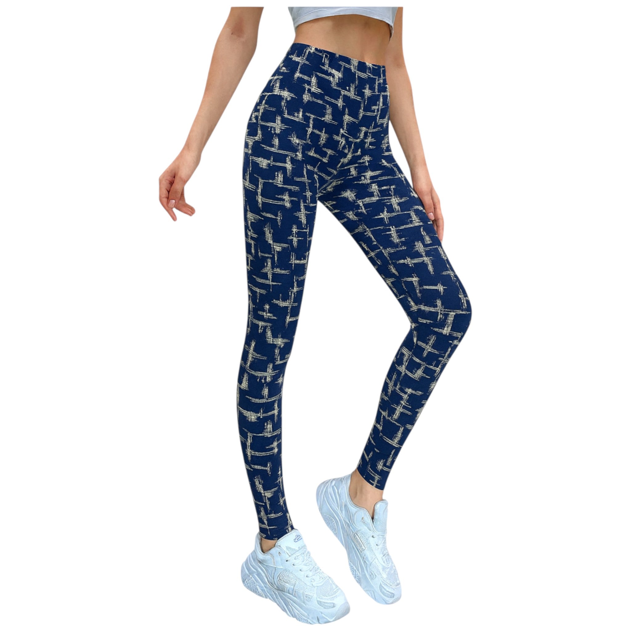 Women's navy blue leggings with beige Aztec-inspired abstract print, full-length stretch fit.